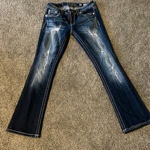 Distressed miss me jeans.